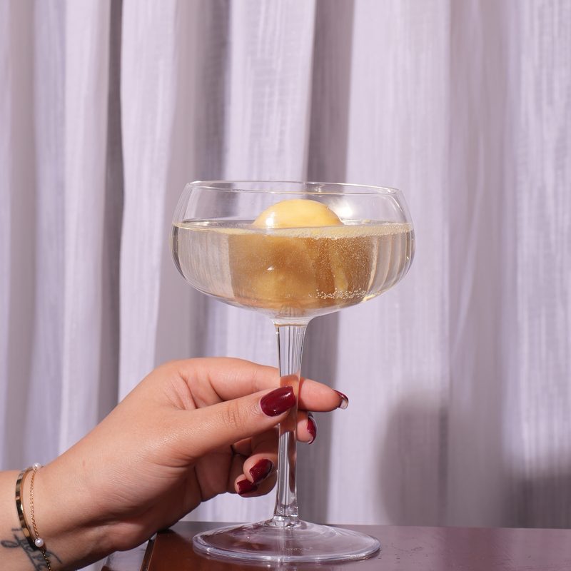 Seasonal sorbet served in a coupe of prosecco
