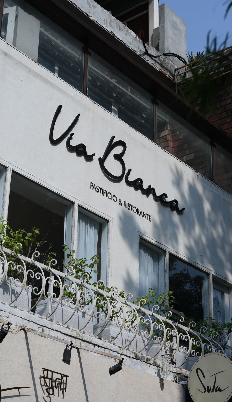 The Via Bianca shopfront on a Greater Kailash street